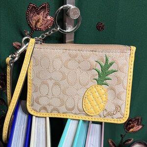 Coach 2019 collection Limited Edition Tan Wristlet with Yellow Pineapple Design